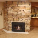 Gas powered fireplace rock mantle