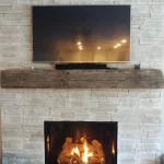 Gas powered fireplace whit brick mantle