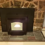 pellet fireplace with brick background